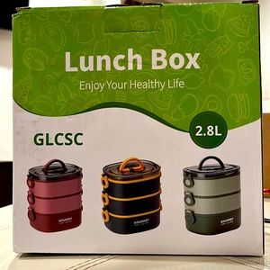 New, never used Bento style lunch box with utensil.